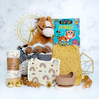 Baby hamper with soft pony plush toy, pop-up book, swaddle, bib, romper and silicon bowl