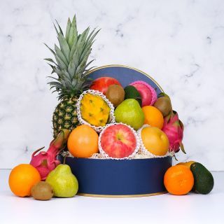 Fresh Fruits gift box with kiwi, pear and pineapple