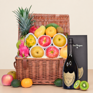 Basket of fresh seasonal fruits and bottle of Dom Perignon Champagne