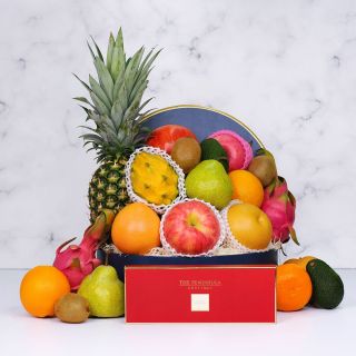 Fresh seasonal fruit hamper with The Peninsula Boutique almond thins